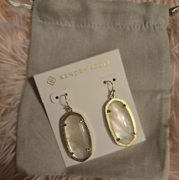 Kendra Scott Elle Gold Drop Earrings in Ivory Pearl. - Picture 10 of 14
